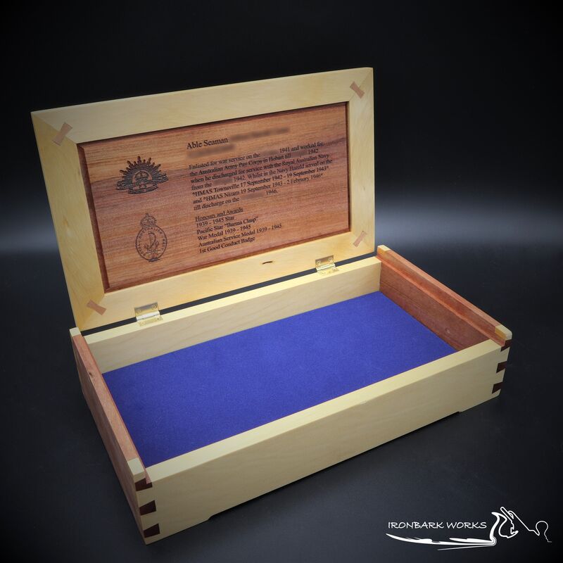 Made from Huon Pine and Myrtle with a blue velour lining this medal box was made to display four medals. Quality stop hinges from Brusso finish off this lovely box which was made for a Sailor who served during World War II. Engraved on the box lid is both the RAN badge (with the Tudor (Kings) Crown) and third edition Rising Sun badge to for time spent in both the Army and the Navy. 