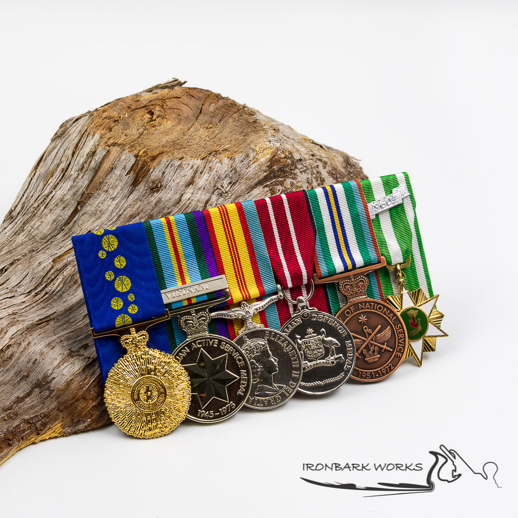 Medal mounting - Ironbark Works - We consider ourselves lucky to have been asked to add the Medal of the Order of Australia (OAM) to this Vietnam Vet's full size and miniature set's. The OAM is for service to veterans and their families, and to surf lifesaving. The medal in this set are Medal of the Order of Australia OAM, Australian Active Service Medal 1945-1975 *VIETNAM*, Vietnam Medal, Australian Defence Medal, Anniversary of National Service 1951-1972 Medal and Republic of Vietnam Campaign Medal